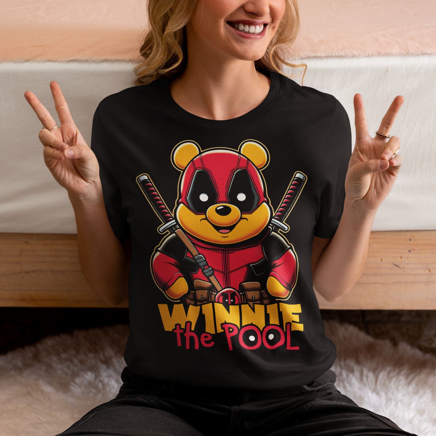 Black t-shirt of Winnie the pooh dressed as a mercenary with samurai swords and text underneath "WINNIE THE POOL".