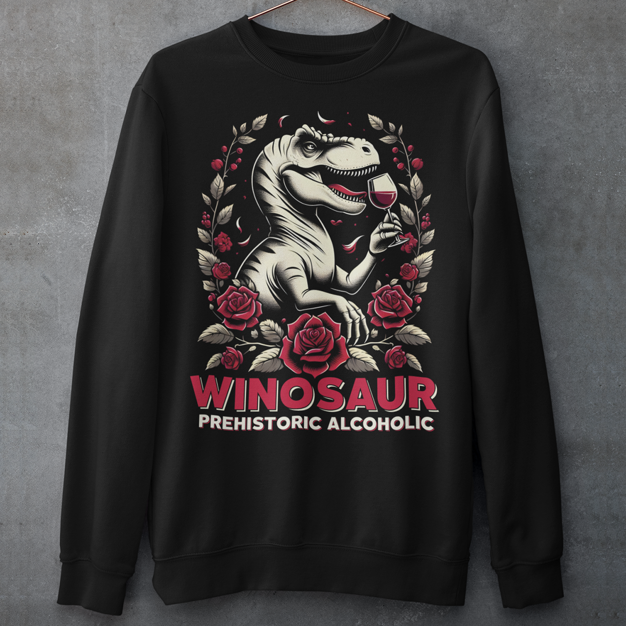 Black sweatshirt of a T-Rex drinking wine with text below WINOSAUR PREHISTORIC ALCOHOLIC.