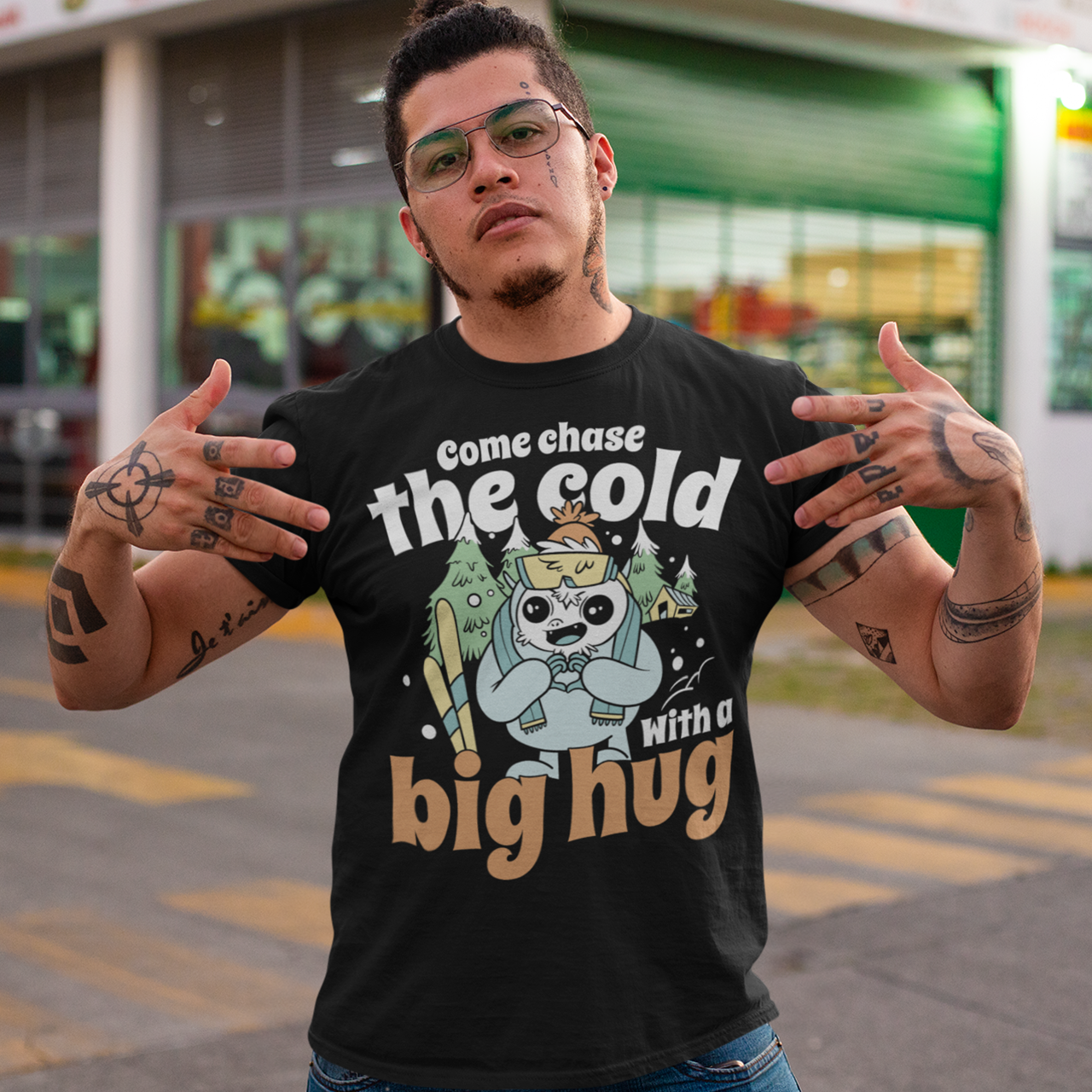 Hit the slopes in style with this playful Yeti Skiing t-shirt! Featuring a whimsical illustration of a friendly yeti standing in the snow, this design pairs perfectly with the cozy, heartwarming message: "Come chase the cold with a big hug." Whether you're a winter sports enthusiast or just love mythical creatures with a soft side, this tee wraps comfort, humor, and chill vibes into one awesome package.