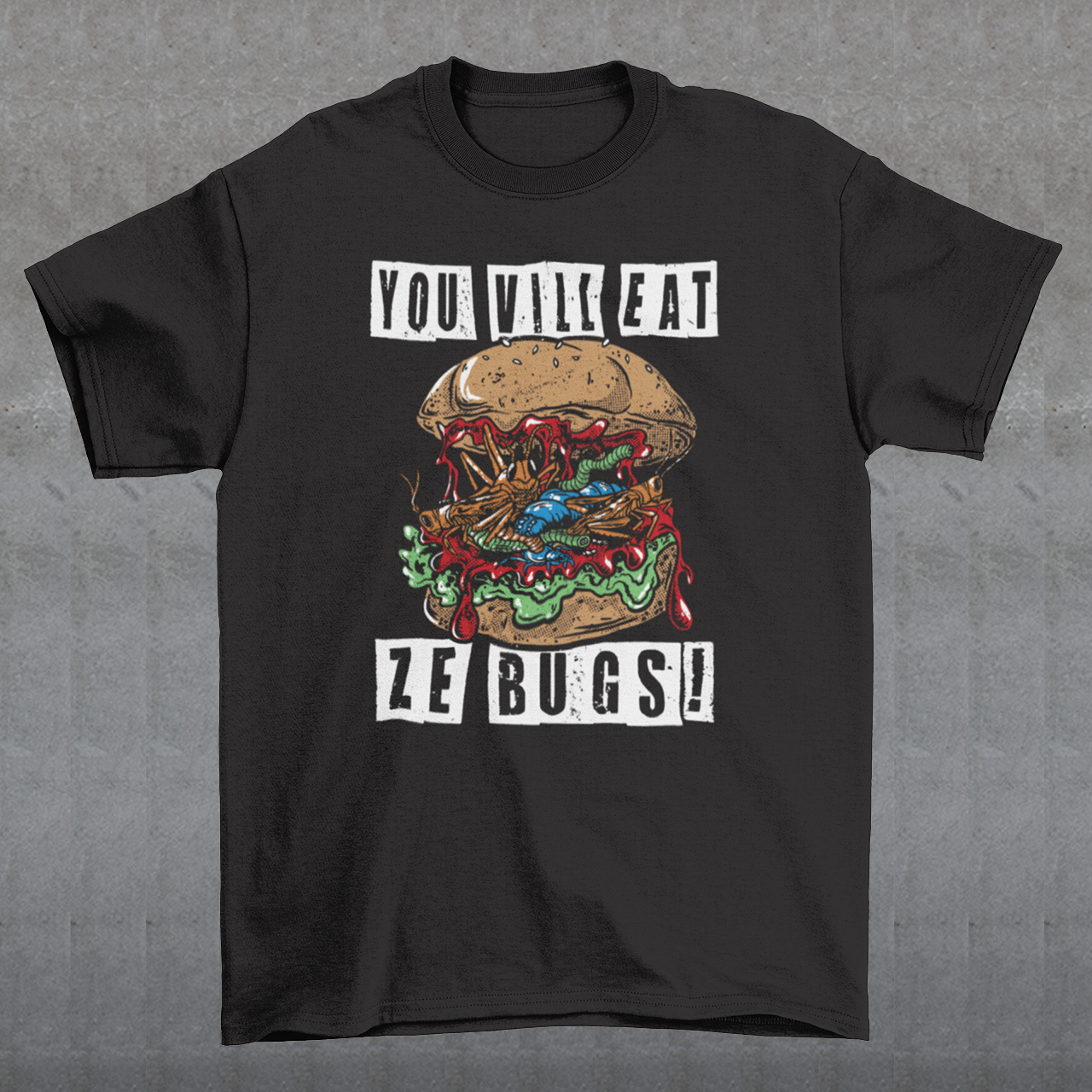 Imagine a t-shirt that challenges perceptions with its bold graphic: a grotesque bug burger, a monstrous assembly of insects that looks simultaneously repulsive and intriguing. The center of attention is this repugnant yet oddly compelling creation that dares you to reconsider your culinary norms.