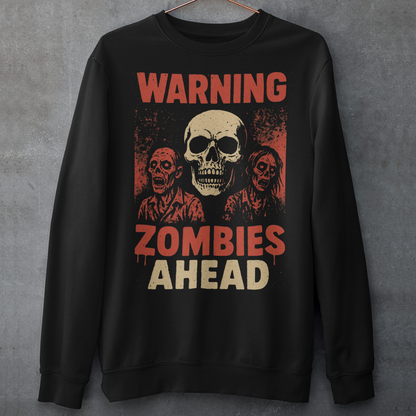 Step into the apocalypse in style with this bold zombie-themed sweatshirt! Featuring a chilling design of creepy, undead zombies, it’s framed by the warning signs you can’t ignore: “WARNING” across the top and “ZOMBIES AHEAD” below. Perfect for horror fans, Halloween lovers, or anyone who enjoys a touch of the macabre, this shirt is sure to grab attention wherever you go.