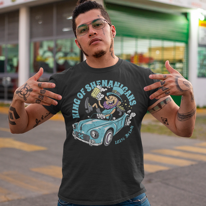 Get ready to stir up some trouble with this hilarious t-shirt featuring a leprechaun enjoying a cold pint of beer in the front seat of a car! With his mischievous grin and twinkling eyes, this little guy is clearly the king of shenanigans.